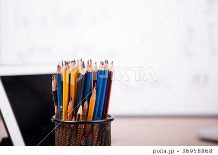 Close up of pencils on blurred white board 36958868