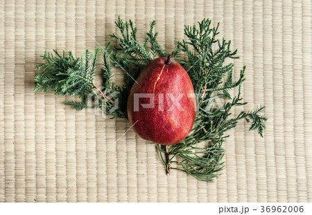 Fresh ripe red pear on pine leaf top view 36962006