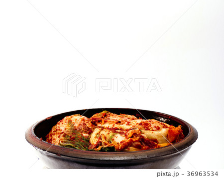 Kimchi in the crock bowl isolated Kimchi in the crock bowl isolated 36963534