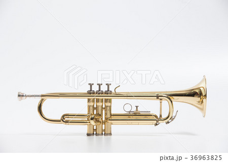 Gold lacquer trumpet with mouthpiece isolated on w 36963825