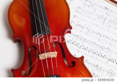 Violin, bow and music sheets Violin, bow and music sheets 36964038
