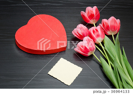 Red box in heart shape, clean card, pink tulips 36964133