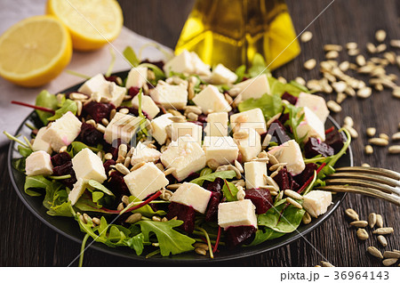 Healthy beetroot salad with feta cheese, arugula Healthy beetroot salad with feta cheese, arugula 36964143