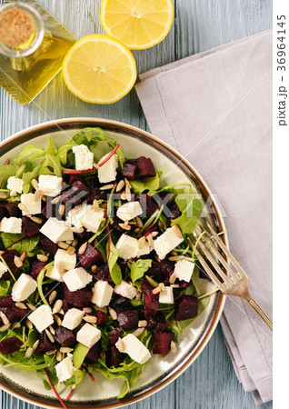 Healthy beetroot salad with feta cheese, arugula Healthy beetroot salad with feta cheese, arugula 36964145
