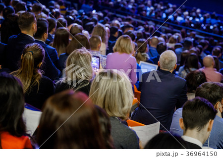 People attend business conference in congress hall 36964150
