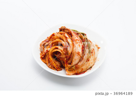 Kimchi on white dish isolated Kimchi on white dish isolated 36964189