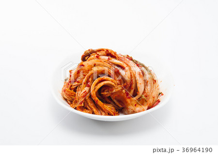 Kimchi on white dish isolated 36964190