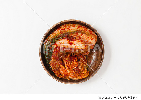 Kimchi in a wooden bowl isolated 36964197