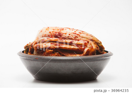 Kimchi on a crock head dish isolated Kimchi on a crock head dish isolated 36964235