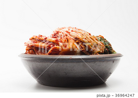 Kimchi on a crock head dish isolated 36964247