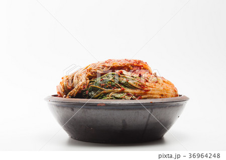 Kimchi on a crock head dish isolated 36964248