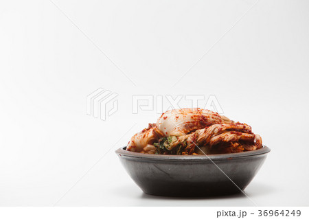 Kimchi on a crock head dish isolated Kimchi on a crock head dish isolated 36964249