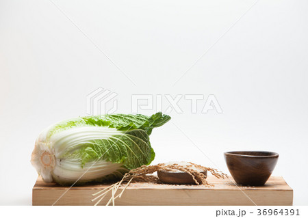 Cabbage with rice on wood bowl. Cabbage with rice on wood bowl. 36964391