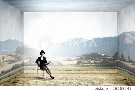 Girl in black cylinder 36968342