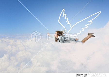 Woman flying high Woman flying high 36969260