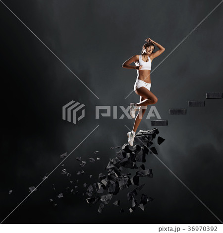 Sports woman overcoming challenges 36970392