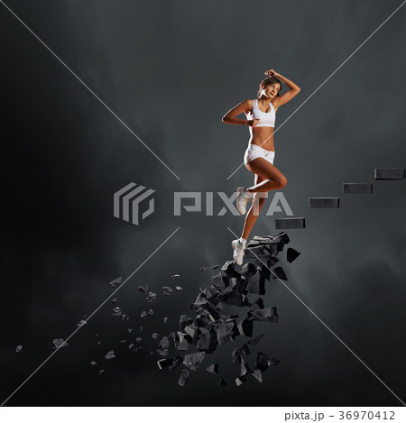 Sports woman overcoming challenges 36970412