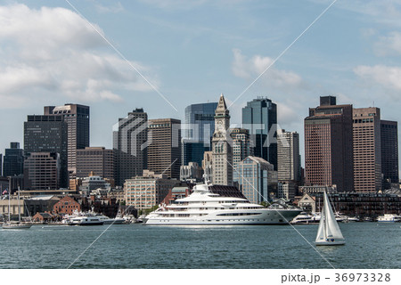Yacht and sailing boats on Charles River in front Yacht and sailing boats on Charles River in front 36973328
