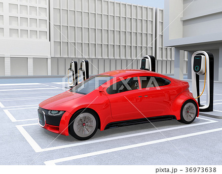 充電スタンドに充電している赤色のスポーツカー 36973638