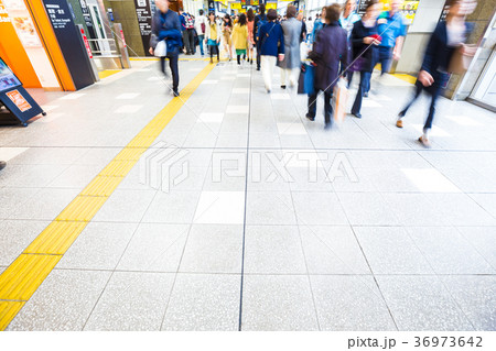 Blurred Business People Rushing for Travel Blurred Business People Rushing for Travel 36973642