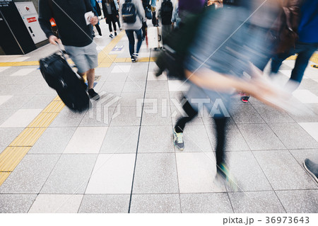 Blurred Business People Rushing for Travel Blurred Business People Rushing for Travel 36973643