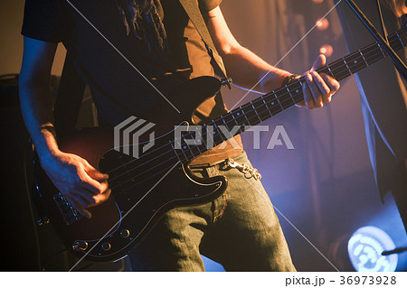 Rock music theme, bass guitar player Rock music theme, bass guitar player 36973928