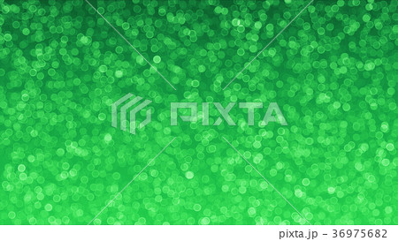 Green glitter glamour background Bokeh 36975682