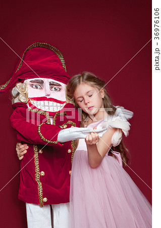 The beauty ballerina who holding a nutcracker The beauty ballerina who holding a nutcracker 36976106