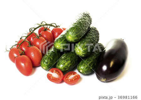 vegetables cucumbers and tomatoes on a white  36981166