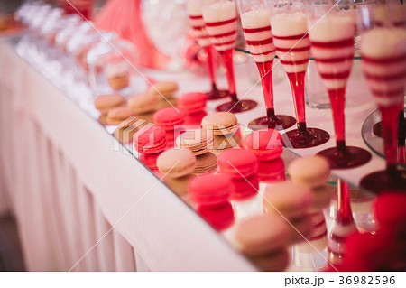Different kinds of baked sweets on a buffet 36982596