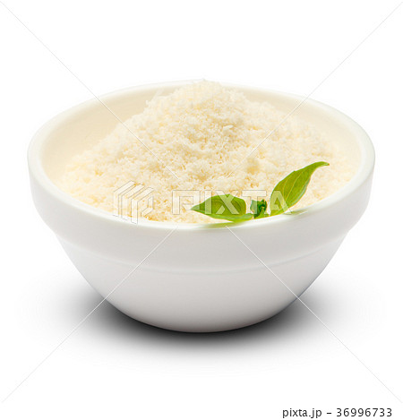 grated Parmesan cheese in ceramic bowl on white 36996733