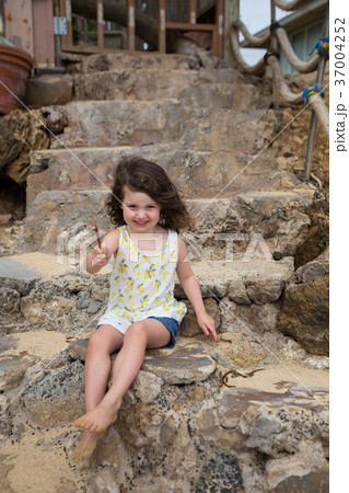 Child Playing on Beach in Oahu Hawaii Child Playing on Beach in Oahu Hawaii 37004252
