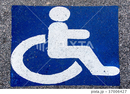handicapped parking sign paint onto asphalt 37006427