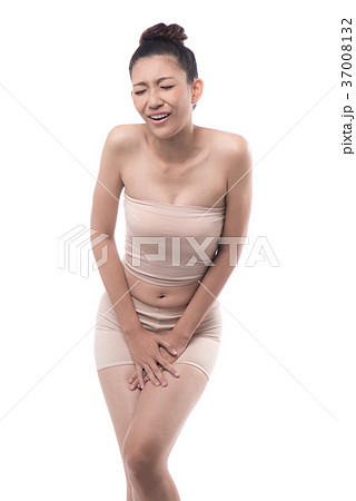 Woman with hands holding her Penis in pain Woman with hands holding her Penis in pain 37008132