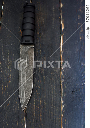 A big hunting knife. A big military knife. A big hunting knife. A big military knife. 37011262