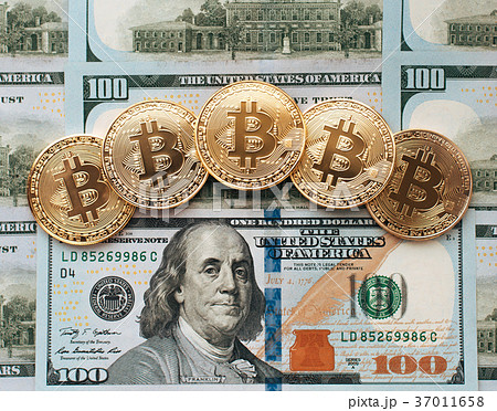 Coins bitcoin, there are money, on table a note of 37011658