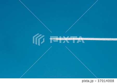 Airplane In The Sky With Plane Trails Airplane In The Sky With Plane Trails 37014008