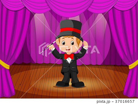 magician performing on a stage magician performing on a stage 37016657