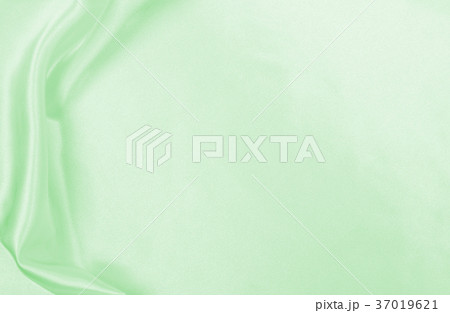 Smooth elegant green silk or satin luxury cloth Smooth elegant green silk or satin luxury cloth 37019621