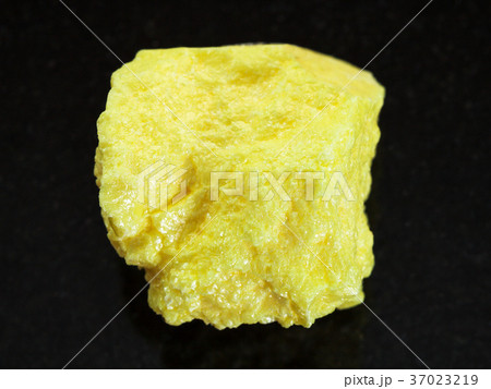 raw native Sulphur stone on dark background 37023219