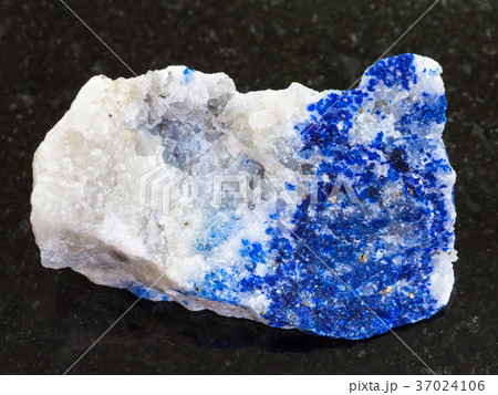 rough lapis lazuli stone on dark background 37024106