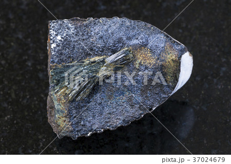 raw Vivianite stone on dark background 37024679