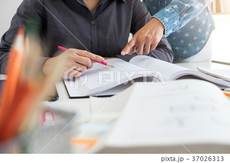 Education, teaching, learning, technology and people concept. Tw 37026313