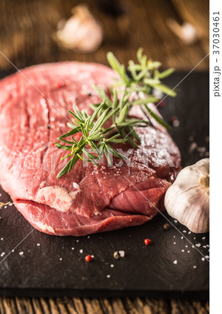 Flank steak with rosemary garlic salt and pepper. Flank steak with rosemary garlic salt and pepper. 37030461