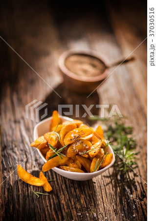 Roasted american potatoes with rosemary and salt. Roasted american potatoes with rosemary and salt. 37030516