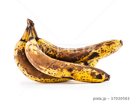 Over ripe bananas isolated on white with shadows. Over ripe bananas isolated on white with shadows. 37030563