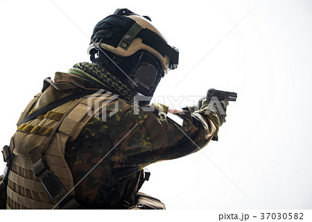 Soldier firing with modern pistol 37030582