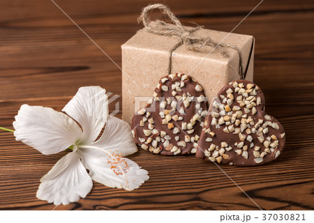 box, dark chocolate heart and hibiscus flower box, dark chocolate heart and hibiscus flower 37030821