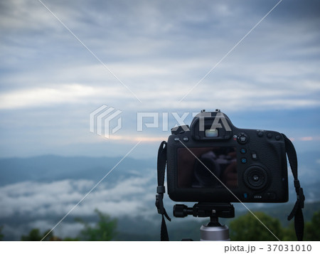 Beautiful cloudy weather in mountains Beautiful cloudy weather in mountains 37031010
