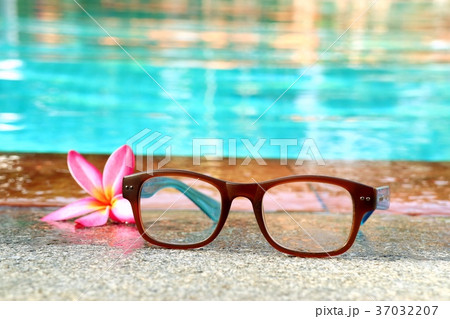 Glasses by the pool Glasses by the pool 37032207
